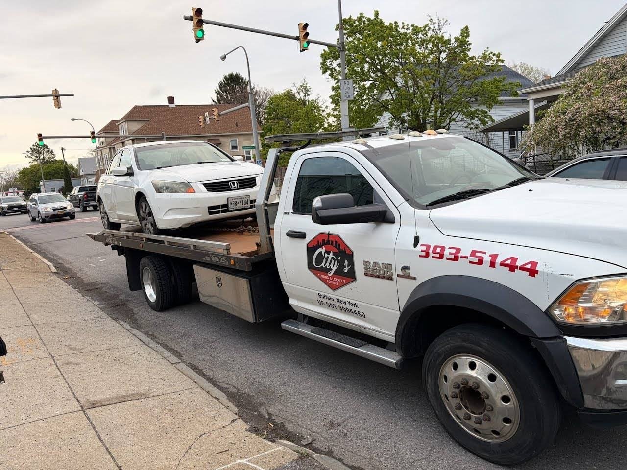 City's Towing Flatbed Truck